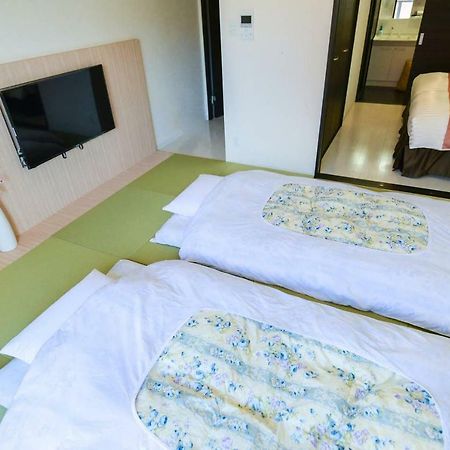 Momo Premium 802 Apartment Sapporo Bagian luar foto